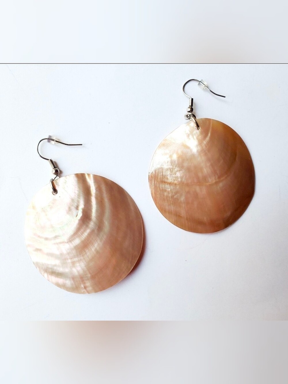 Circular shell earrings. New, never worn